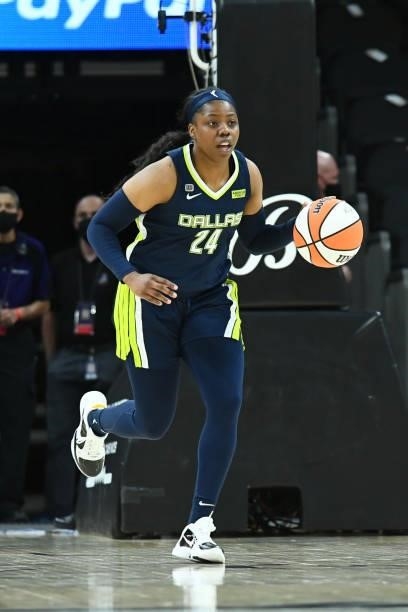 Arike Ogunbowale of the Dallas Wings handles the ball against the Phoenix Mercury on June 8, 2021 at Phoenix Suns Arena in Phoenix, Arizona. NOTE TO...