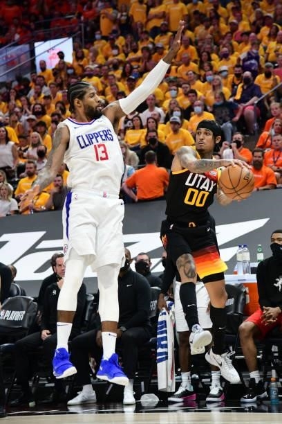 Paul George of the LA Clippers plays defense on Jordan Clarkson of the Utah Jazz during Round 2, Game 1 of the 2021 NBA Playoffs on June 8, 2021 at...