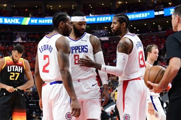 Kawhi Leonard and Marcus Morris Sr. #8 talk with Paul George of the LA Clippers during Round 2, Game 1 of the 2021 NBA Playoffs on June 8, 2021 at...