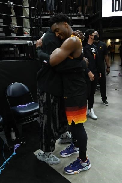 Minority Owner, Dwyane Wade of the Utah Jazz talks with Donovan Mitchell during Round 2, Game 1 of the 2021 NBA Playoffs on June 8, 2021 at...