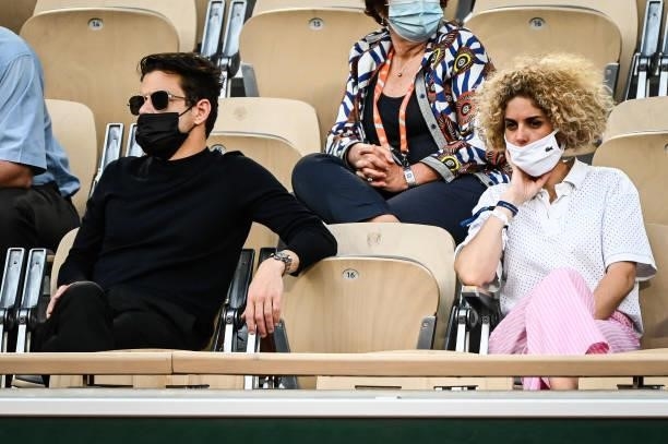 Rami MALEK and his friend during the sixth round of Roland Garros at Roland Garros on June 8, 2021 in Paris, France.