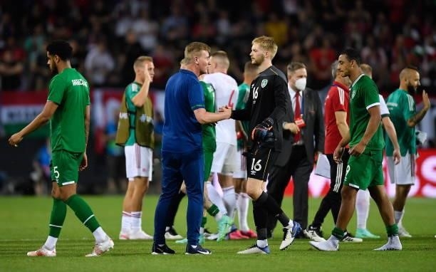 Budapest , Hungary - 8 June 2021; Republic of Ireland manager Stephen Kenny and goalkeeper Caoimhin Kelleher following the international friendly...