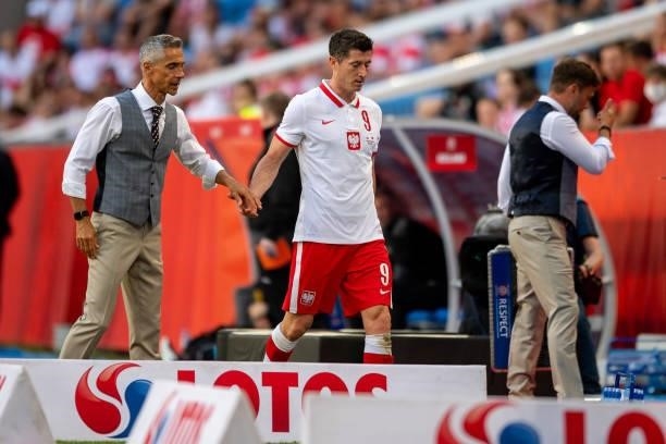 Coach of Poland Paulo Sousa and Robert Lewandowski of Poland after substitution during the international friendly match between Poland and Iceland at...