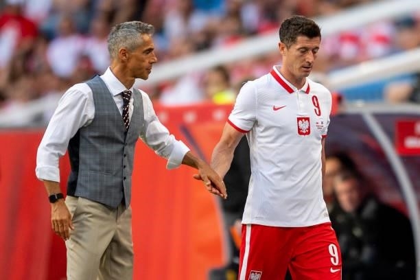 Coach of Poland Paulo Sousa and Robert Lewandowski of Poland after substitution during the international friendly match between Poland and Iceland at...