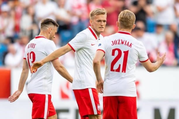 Karol Swiderski of Poland and Kamil Jozwiak of Poland gestures during the international friendly match between Poland and Iceland at Stadion Miejski...