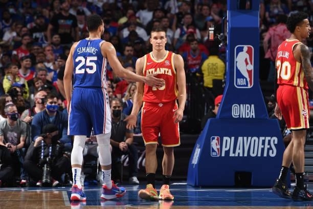 Ben Simmons of the Philadelphia 76ers and Bogdan Bogdanovic of the Atlanta Hawks high-five during Round 2, Game 2 of the Eastern Conference Playoffs...
