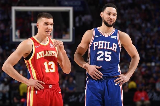 Bogdan Bogdanovic of the Atlanta Hawks and Ben Simmons of the Philadelphia 76ers smile during Round 2, Game 2 of the Eastern Conference Playoffs on...