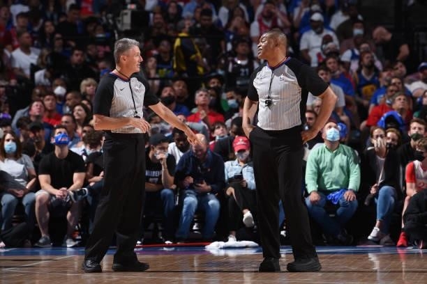 Referees Scott Foster and Tony Brothers talk during Round 2, Game 2 of the Eastern Conference Playoffs on June 8, 2021 at Wells Fargo Center in...