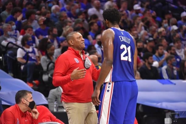 Head Coach Doc Rivers and Joel Embiid of the Philadelphia 76ers talk during Round 2, Game 2 of the Eastern Conference Playoffs on June 8, 2021 at...