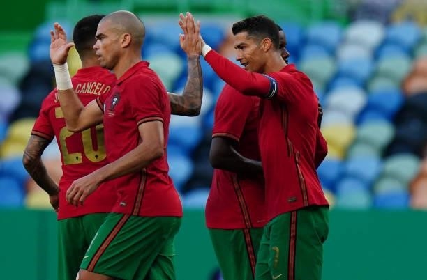 Cristiano Ronaldo of Portugal and Juventus celebrates with teammates after scoring a goal during the International Friendly match between Portugal...