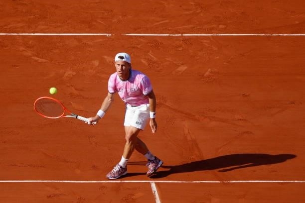Argentina's Diego Schwartzman returns the ball to Spain's Rafael Nadal during their men's singles quarter-final tennis match on Day 11 of The Roland...