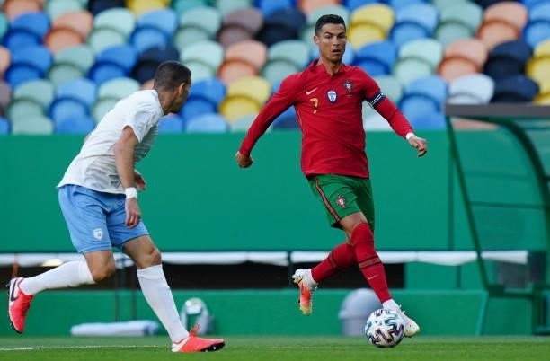 Cristiano Ronaldo of Portugal and Juventus with Eytan Tibi of Israel and Maccabi Tel Aviv FC in action during the International Friendly match...
