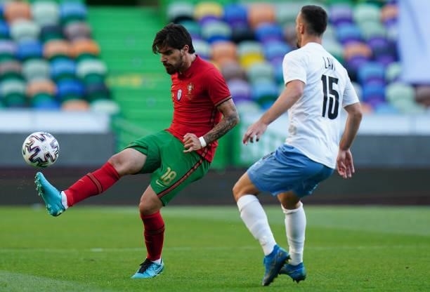 Ruben Neves of Portugal and Wolverhampton with Neta Lavi of Israel and Maccabi Haifa FC in action during the International Friendly match between...