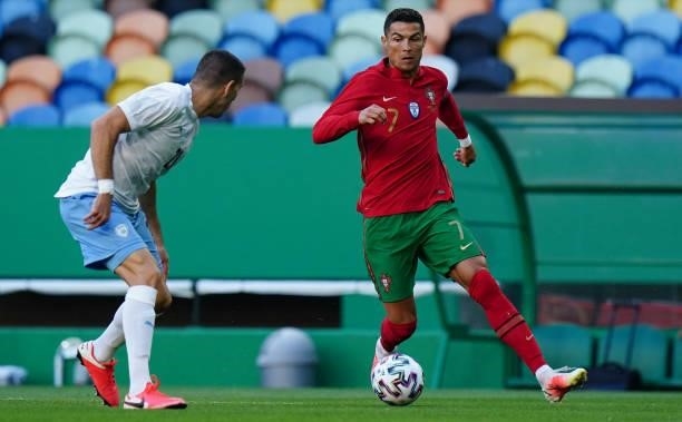 Cristiano Ronaldo of Portugal and Juventus with Eytan Tibi of Israel and Maccabi Tel Aviv FC in action during the International Friendly match...