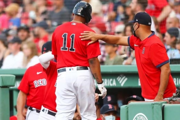 Rafael Devers of the Boston Red Sox scores in the first inning of a game against the Houston Astros at Fenway Park on June 9, 2021 in Boston,...