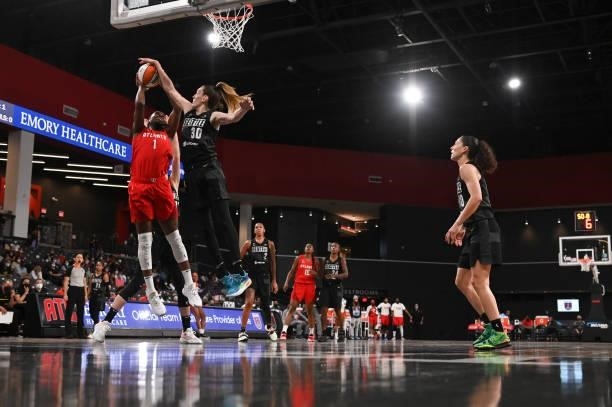 Breanna Stewart of the Seattle Storm blocks Elizabeth Williams of the Atlanta Dream during the game on June 9, 2021 at Gateway Center Arena in...