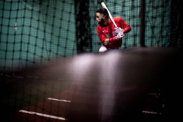 Marwin Gonzalez of the Boston Red Sox takes batting practice in the batting cage before a game against the Houston Astros on June 9, 2021 at Fenway...