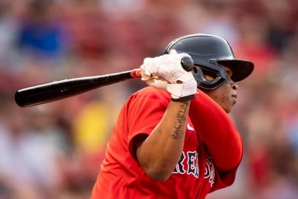 Rafael Devers of the Boston Red Sox hits a double during the first inning of a game against the Houston Astros on June 9, 2021 at Fenway Park in...