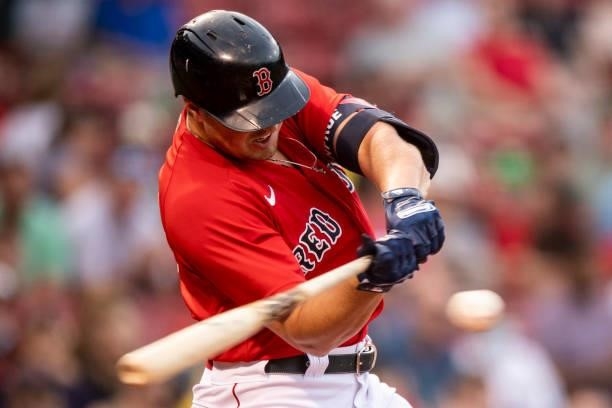 Hunter Renfroe of the Boston Red Sox hits an RBI single during the first inning of a game against the Houston Astros on June 9, 2021 at Fenway Park...