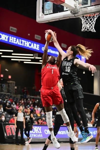 Breanna Stewart of the Seattle Storm blocks Elizabeth Williams of the Atlanta Dream during the game on June 9, 2021 at Gateway Center Arena in...