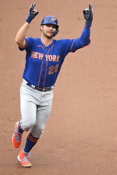 Pete Alonso of the New York Mets celebrates hitting a two-run home run in the first inning during a game against the Baltimore Orioles at Oriole Park...