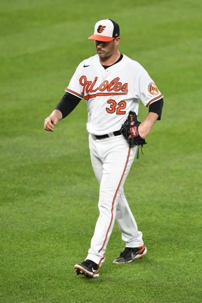 Matt Harvey of the Baltimore Orioles walks back to the dug out in the third inning during a game against the New York Mets at Oriole Park at Camden...
