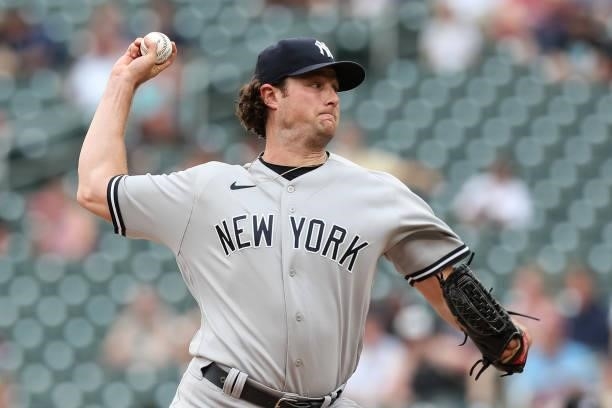 Gerrit Cole of the New York Yankees delivers a pitch against the Minnesota Twins in the first inning of the game at Target Field on June 9, 2021 in...