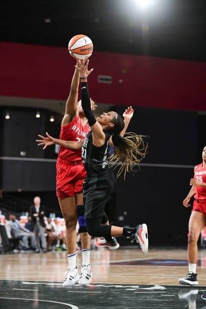Tianna Hawkins of the Atlanta Dream blocks Jordin Canada of the Seattle Storm during the game on June 9, 2021 at Gateway Center Arena in College...