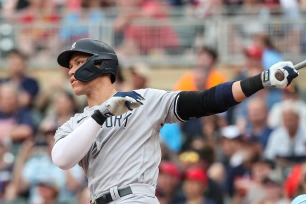 Aaron Judge of the New York Yankees hits a solo home run against the Minnesota Twins in the first inning of the game at Target Field on June 9, 2021...