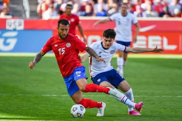 Gio Reyna of the United States and Francisco Calvo of Costa Rica compete for the ball during a game at Rio Tinto Stadium on June 09, 2021 in Sandy,...