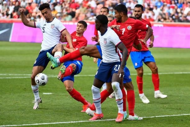 Antonee Robinson of the United States fights for the ball with Joseph Mora of Costa Rica during a game at Rio Tinto Stadium on June 09, 2021 in...