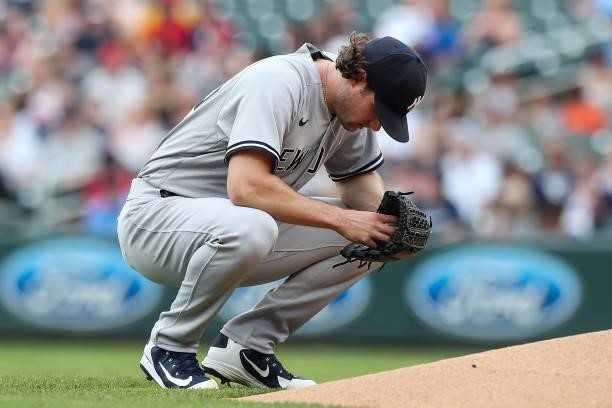 Gerrit Cole of the New York Yankees takes a moment to himself before pitching to the Minnesota Twins in the first inning of the game at Target Field...