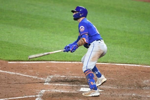Kevin Pillar of the New York Mets hits a solo home run in the eighth inning during a game against the Baltimore Orioles at Oriole Park at Camden...