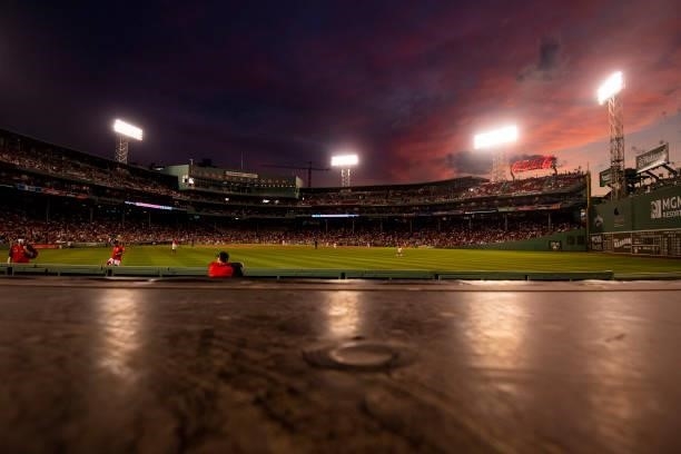 General view as the sun sets during a game between the Boston Red Sox and the Houston Astros on June 9, 2021 at Fenway Park in Boston, Massachusetts.