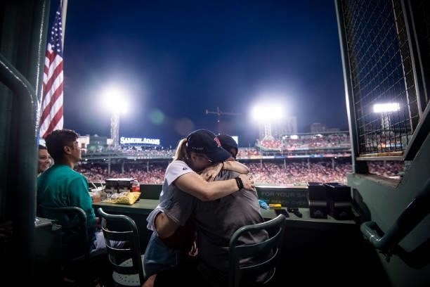Fans react after becoming engaged during a marriage proposal during a game between the Boston Red Sox and the Houston Astros on June 9, 2021 at...