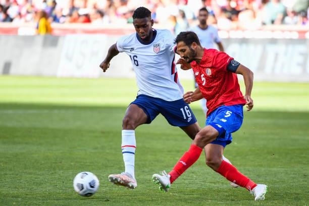 Jordan Siebatcheu of the United States fights for the ball with Celso Borges of Costa Rica during a game at Rio Tinto Stadium on June 09, 2021 in...