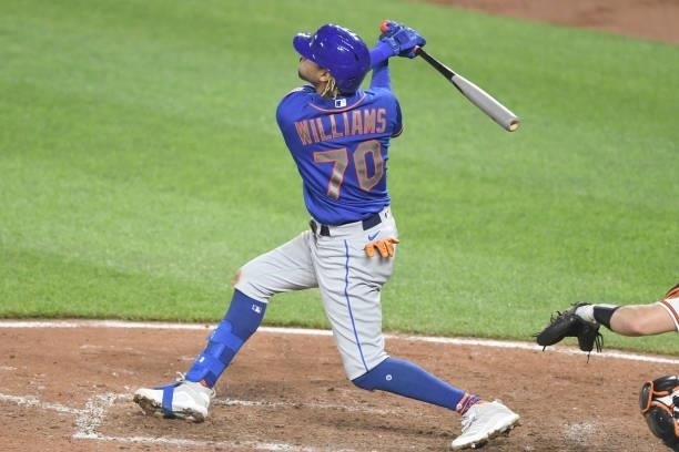 Mason Williams of the New York Mets hits a solo home run in the eighth inning during a game against the Baltimore Orioles at Oriole Park at Camden...