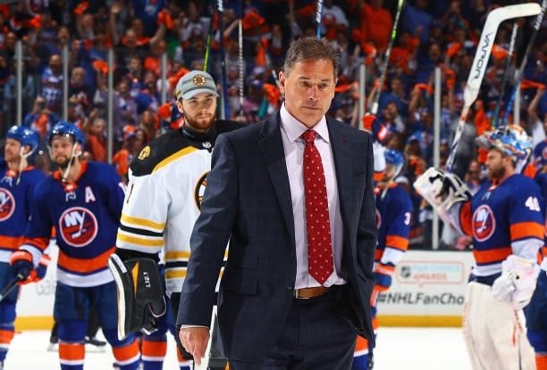 Head coach Bruce Cassidy of the Boston Bruins walks off the ice after his teams 6-2 loss to the New York Islanders in Game Six of the Second Round of...
