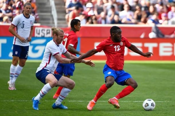 Joel Campbell of Costa Rica fights for the ball with Tim Ream of the United States during a game at Rio Tinto Stadium on June 09, 2021 in Sandy, Utah.