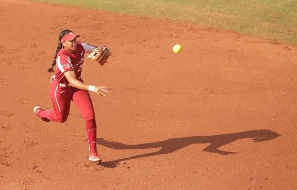 Tiare Jennings of the Oklahoma Sooners fields a ball during the Division I Women's Softball Championship held at ASA Hall of Fame Stadium on June 9,...