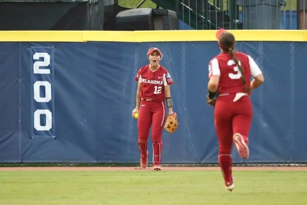 Mackenzie Donihoo of the Oklahoma Sooners reacts against the Florida St. Seminoles during the Division I Women's Softball Championship held at ASA...