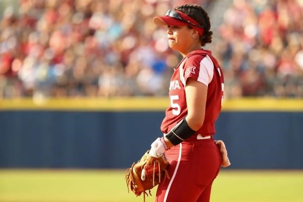 Taylon Snow of the Oklahoma Sooners looks on against the Florida St. Seminoles during the Division I Women's Softball Championship held at ASA Hall...
