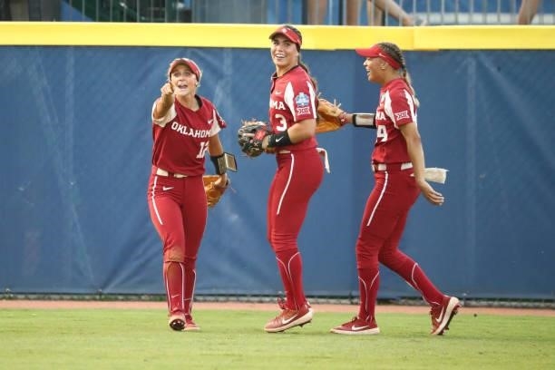 Mackenzie Donihoo of the Oklahoma Sooners reacts with Grace Lyons of the Oklahoma Sooners against the Florida St. Seminoles during the Division I...