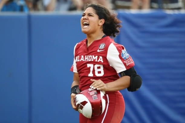 Jocelyn Alo of the Oklahoma Sooners reacts after hitting a two-run home run against the Florida St. Seminoles during the Division I Women's Softball...