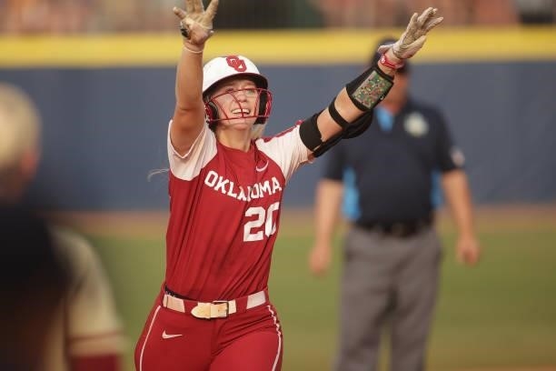 Jana Johns of the Oklahoma Sooners celebrates a home run during the Division I Women's Softball Championship held at ASA Hall of Fame Stadium on June...