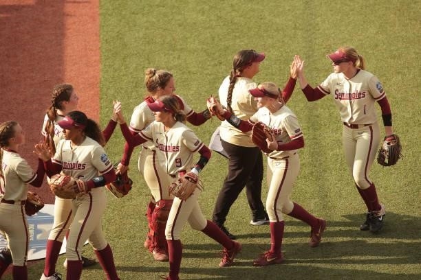 The Florida State Seminoles leave the field during the Division I Women's Softball Championship held at ASA Hall of Fame Stadium on June 9, 2021 in...