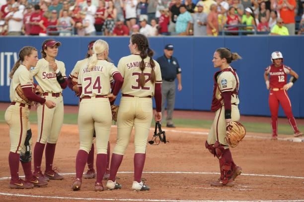 Kathryn Sandercock of the Florida St. Seminoles talks to her team on the mound during the Division I Women's Softball Championship held at ASA Hall...