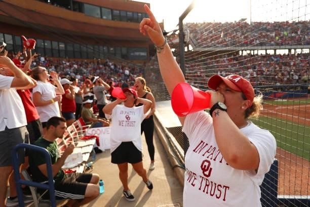 Fans react during the game between the Oklahoma Sooners and the Florida St. Seminoles during the Division I Women's Softball Championship held at ASA...