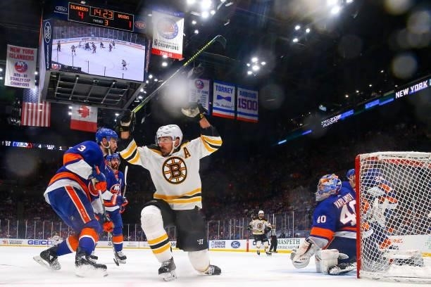 Brad Marchand of the Boston Bruins celebrates after scoring a goal past Semyon Varlamov of the New York Islanders during the third period in Game Six...