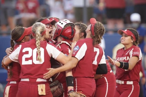 Giselle Juarez of the Oklahoma Sooners and her team celebrate after winning Game Two during the Division I Women's Softball Championship held at ASA...